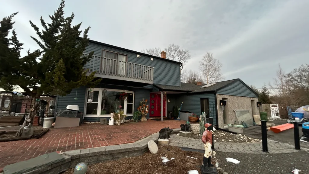How to Choose a Roofing Contractor in Bucks County PA (Without Getting Burned) 1 YBR GROUP Inc roofing contractor on a steep residential roof in Pennsylvania