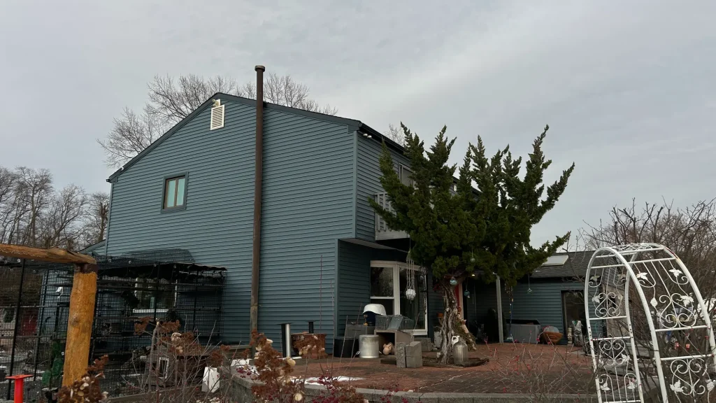 Why Your Attic Is Destroying Your Bucks County Home (And How to Fix It Before Summer) 2 Hail and storm damage inspection on a Bucks County PA home - YBR GROUP Inc assesses roof, siding, and windows