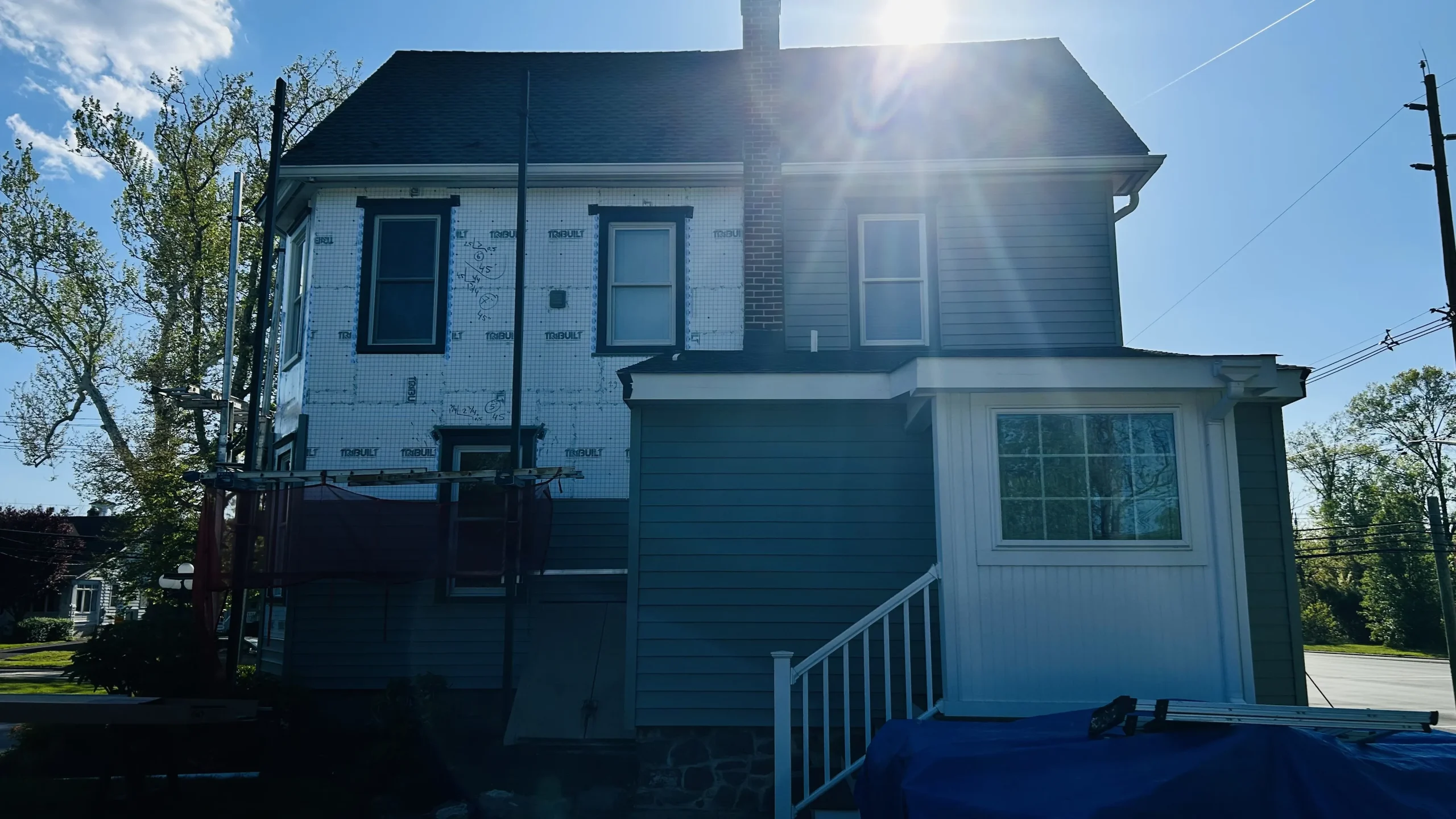 Replacement Windows for Pennsylvania Homes: What to Know Before You Buy 2 YBR GROUP window capping and fascia installation on Medford PA home